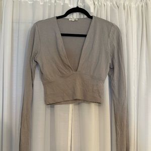 Cropped deep v neck lavender top from aritiza